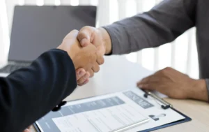 Property-Fund-Manager-shaking-hands-in-a-professional-meeting-symbolizing-partnership-and-investment-success