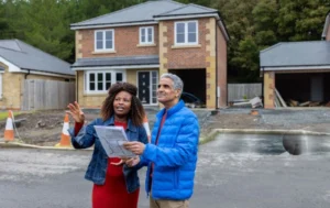 homeowners-discussing-property-maintenance-cost-and-repairs