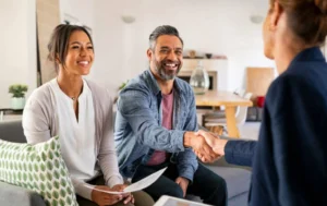 Couple-meeting-advisor-about-care-home-investment-opportunity