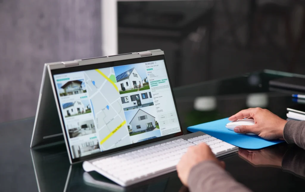 Person-using-laptop-to-view-property-listings-and-maps–Provider-Updates–Prem-Property