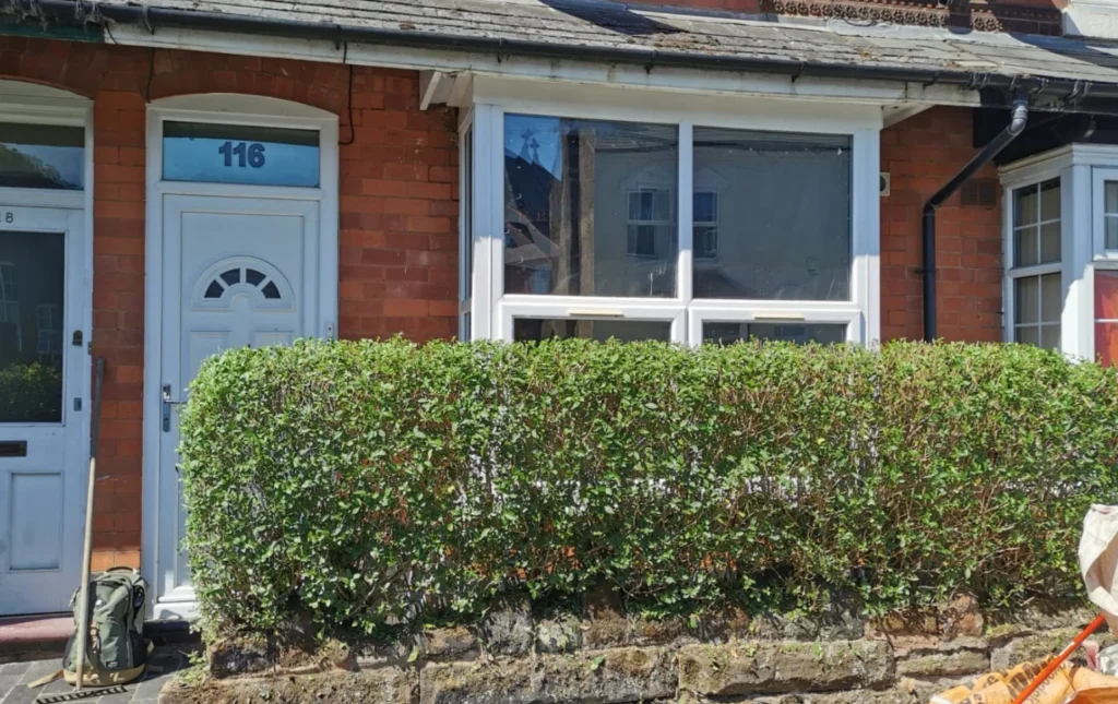 Teignmouth-Road-red-brick-residential-property-exterior-with-front-hedge